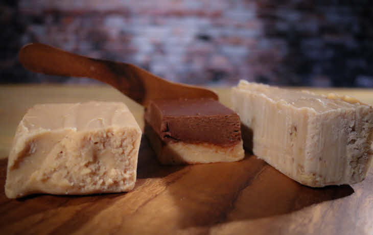 Cut pieces of fudge by weight.